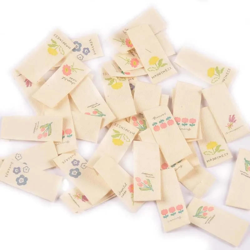 Description Picture 6 of item50Pcs/Lot 1.6x3.8cm Flower Beige Labels For Sewing Supplies Care Bags Clothes Tag Garment Handmade Accessories DIY Crafts C2887