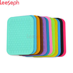 Silicone Pot Holder trivet Mat jar Opener, spoon Rest Garlic Peeler, Non Slip, durable, dishwasher Safe, heat Resistant Hot Pads