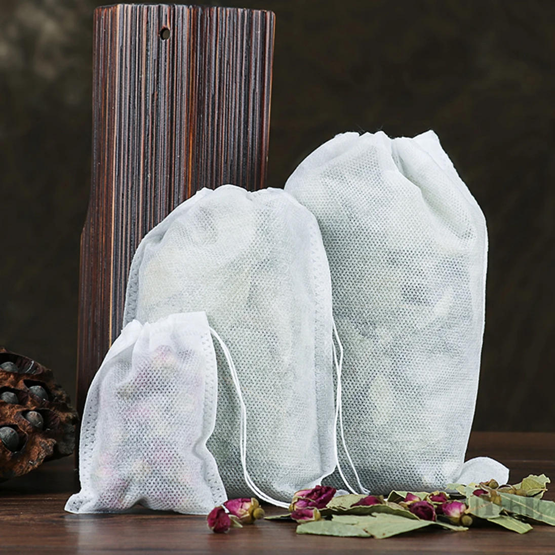 Description Picture 3 of item100Pcs Large Disposable Teabags Tea Filter Infusers 15x20/20x30cm Empty Tea Bags Non-woven Fabric Drawstring Seal Tea Bags