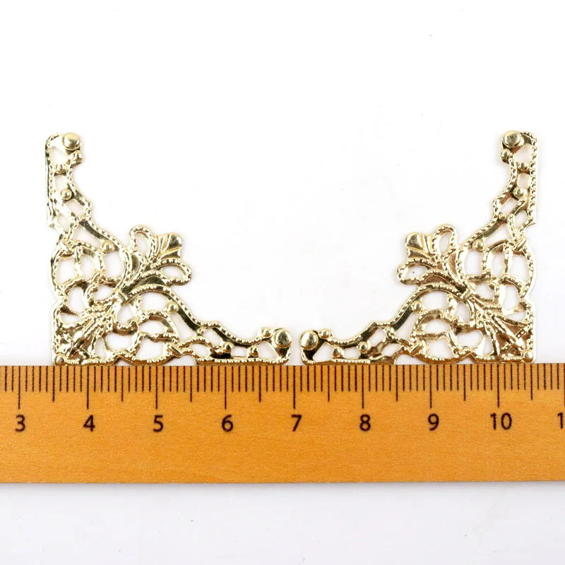 Description Picture 3 of itemMetal Corners For Books Scrapbooking Photo Albums Menus Corner Protectors Metal Crafts DIY Ornament 35x35mm 20pcs