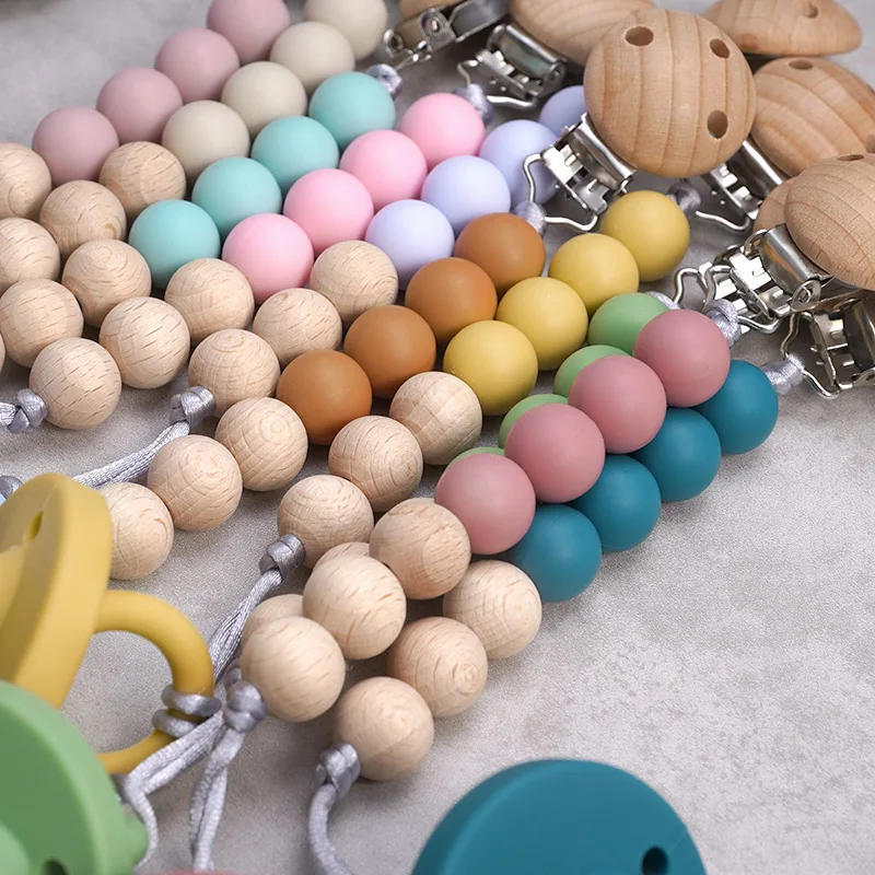 Description Picture 4 of itemFood Grade New Design Silicone Infant Teething Chain Solid Color Safety Baby Pacifier Clips Eco-friendly Newborn Teething Gifts