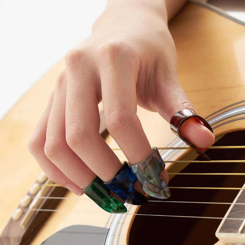 Description Picture 3 of item4pcs/set 1 Thumb + 3 Fingers Guitar Picks Silicone Finger Protector Finger Cover Picks for Beginners Guitar Accessories