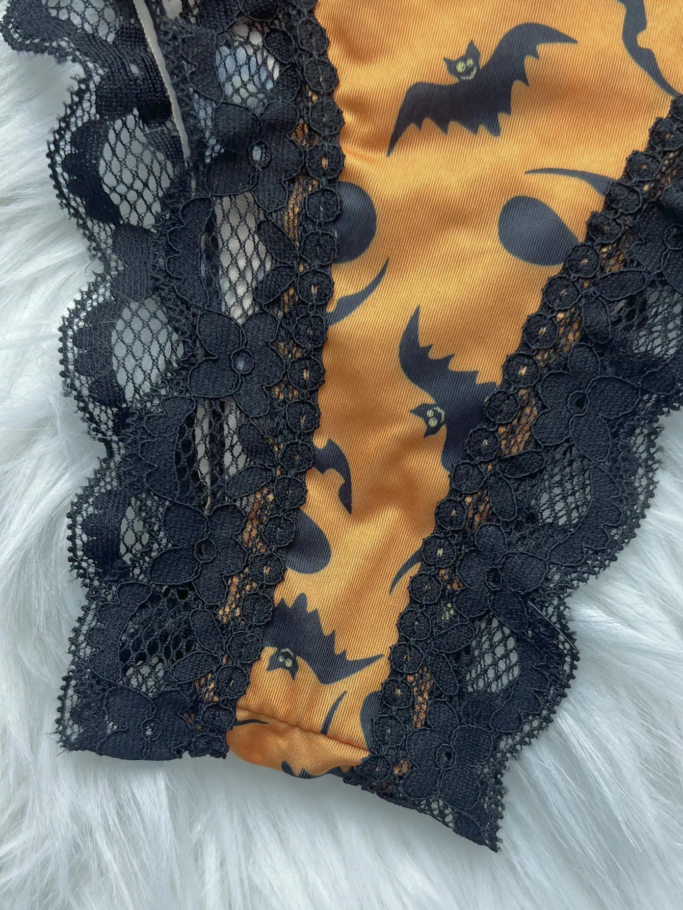 Description Picture 6 of itemGoth Sexy Underwear Lace Patchwork Halloween Print Graffiti Christmas Seamless Ice Silk T Pants Breathable Girls' Thong