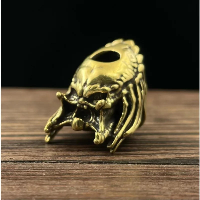 Description Picture 3 of itemAlien Beast Face Iron Warrior Knife Bead Handmade Woven Paracord Lanyard DIY Pendants Jewelry Accessories Brass EDC Outdoor Tool