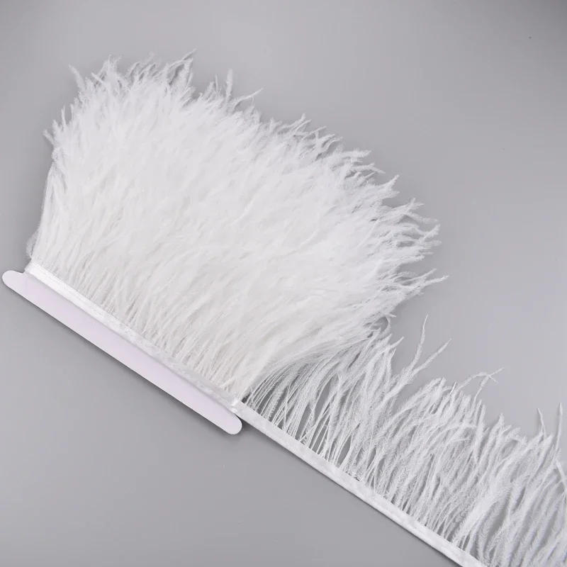 Description Picture 5 of item1Meter White Ostrich Feathers on Ribbon Tape 10-15CM Feather Tassel Fringe Trim Boa Sewing Flecos Needlework Clothes Decoration