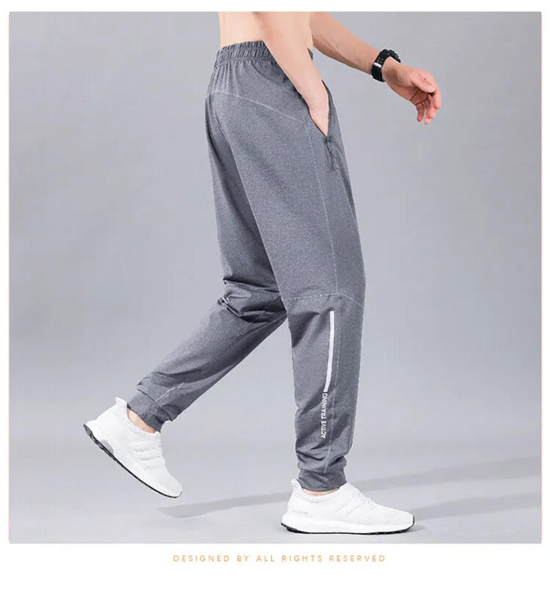 Description Picture 6 of itemSpring And Summer Fashion New Men's Casual Pants Solid Color Drawstring Slim Ice Silk Quick-Drying Sports Pants Leisure Men