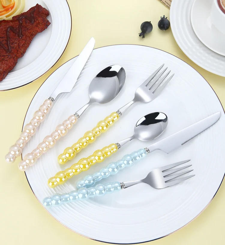 Description Picture 4 of item4Pcs Gold Dinnerware Set Stainless Steel Cutlery Knife Tea Fork Coffee Spoon Pearl Ceramic Handle Flatware Utensils for Kitchen