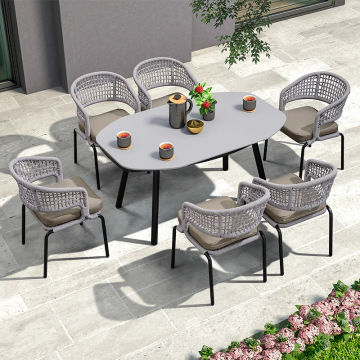 Nordic outdoor table and chair combination outdoor courtyard rope woven leisure dining chair terrace designer garden dining chai