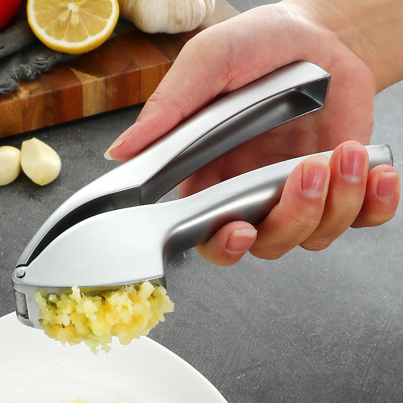 Description Picture 2 of itemGarlic Press Crusher Mincer with Sturdy Construction Professional Food Grade Rust proof Easy Squeeze and Clean