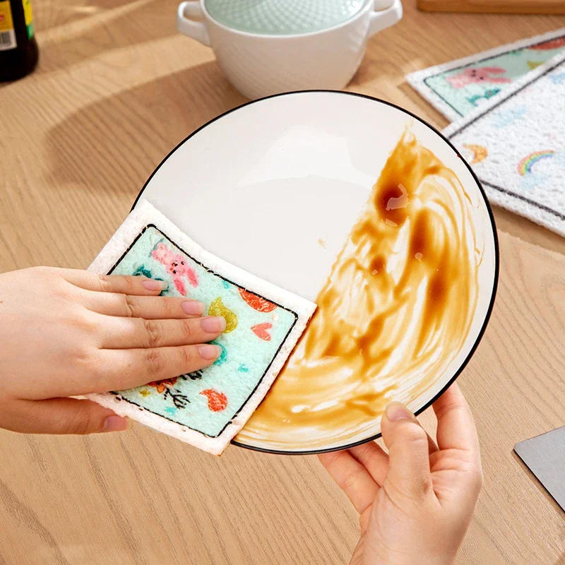 Description Picture 4 of itemNon-stick Cartoon Wood Pulp Cotton Magic Sponge Compressed Magic Wipes Dish Cloths Absorbent Cleaning Sponges Kitchen Tools