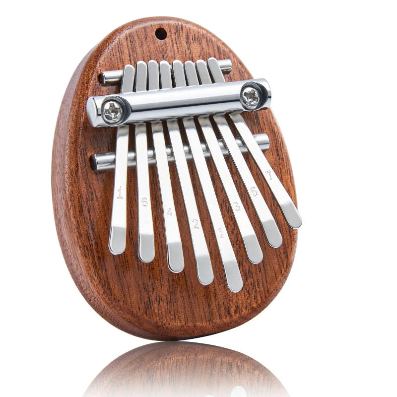Description Picture 2 of itemMini Kalimba 8 Key Thumb Piano 1 Pack Water Drop Style Cute Instrument Portable Exquisite Gift Set for Kids