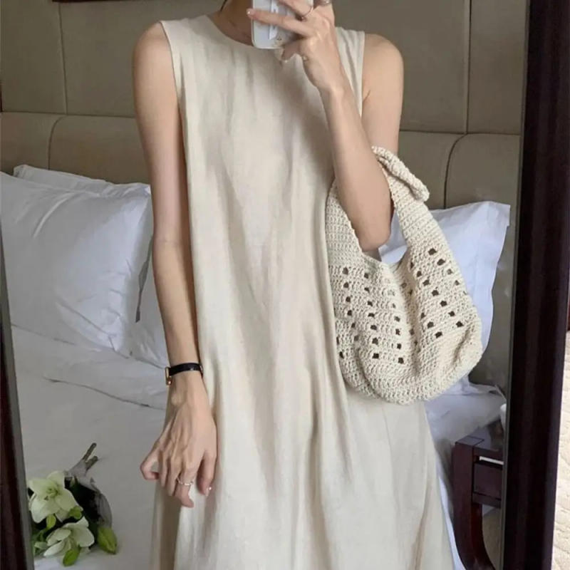 Description Picture 5 of itemFashion Solid Summer Sleeveless Dress Hollowed Out Round Neck Vocation Vest Dresses Beachwear Simple Open Back Long Dress Ladies