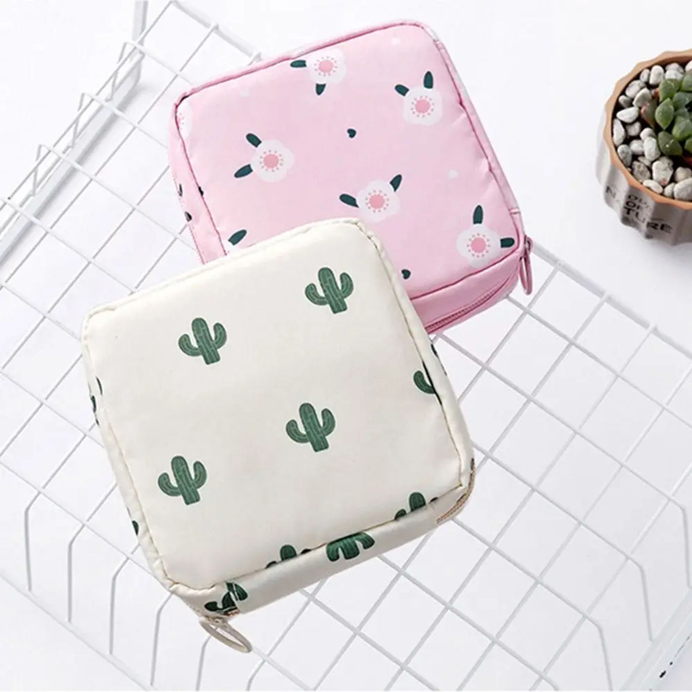 Description Picture 6 of itemNEW portable women's sanitary pads, sanitary tampons, storage style waterproof storage bag, cartoon pattern sanitary pad bag