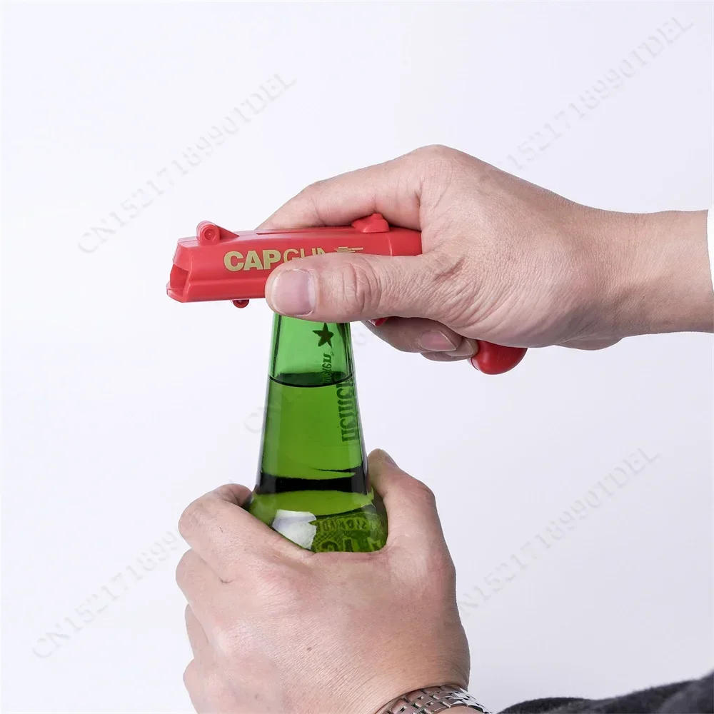 Description Picture 6 of itemCreative Can Opener Spring Cap Catapult Launcher Gun Shape Bar Tool Drink Opening Shooter Beer Bottle Opener Kitchen Gadget Set