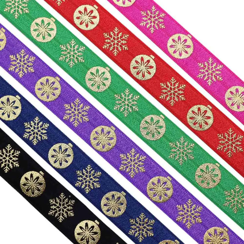 Description Picture 3 of item5/8'' 15MM Gold Foil Christmas Snowflake Printed Fold Over Elastic Band FOE Ribbon For Christmas Decoration DIY Sewing