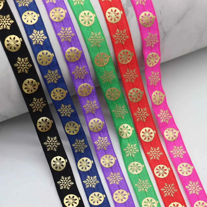 Description Picture 2 of item5/8'' 15MM Gold Foil Christmas Snowflake Printed Fold Over Elastic Band FOE Ribbon For Christmas Decoration DIY Sewing