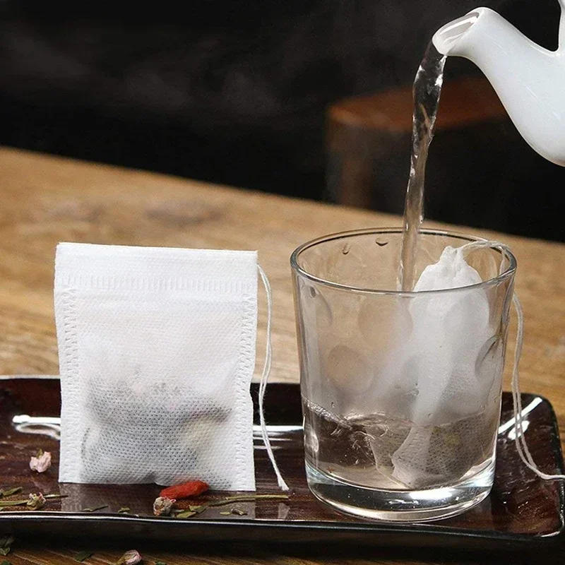 Description Picture 3 of item50pcs/lot Disposable Teabags Non-woven Fabric Tea Filter Bags for Coffee Spice Tea Bag with Drawstring Filters Kitchen Teaware