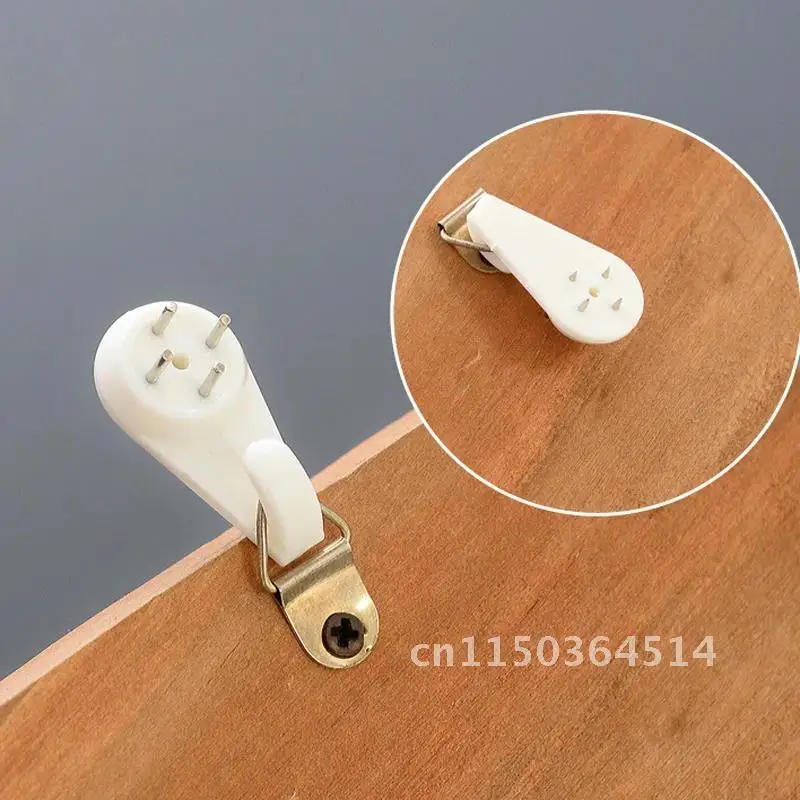 Description Picture 6 of item10pcs Seamless White Plastic Invisible Wall Mount Photo Picture Frame Nail Hook Hanger Hard Picture Frame Wall Hooks Nail