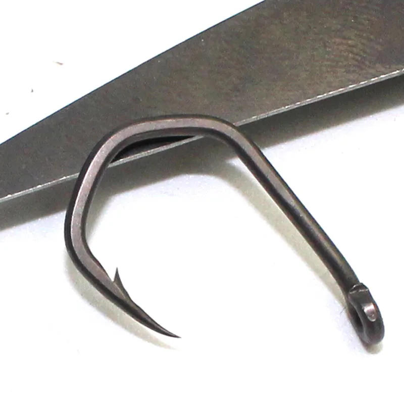 Description Picture 4 of item20PCS PTFE  Coated Carp Fishing Hooks High Carbon Steel Fishhooks Matt Black Barbed Curve Shank Gripper Style Sharp Carp Hooks
