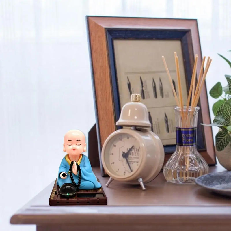 Description Picture 3 of itemSolar Powered Bobble Shaking Head Dancing Toy Buddhist Monk Figurines Statues Car Dash Board Home Office Decorations