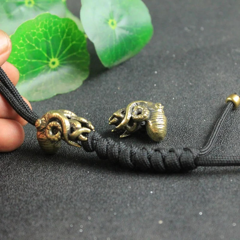 Description Picture 6 of itemRetro Brass Sea Animal Octopus Knife Beads Outdoor EDC Umbrella Rope Pendant DIY Paracord Bracelets Accessories Lanyard Hangings