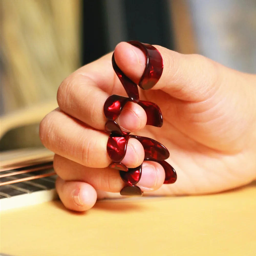 Description Picture 4 of item4pcs/set 1 Thumb + 3 Fingers Guitar Picks Silicone Finger Protector Finger Cover Picks for Beginners Guitar Accessories