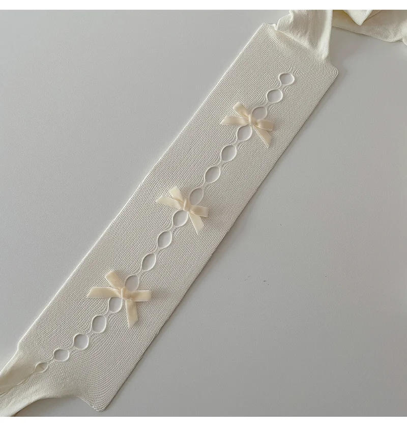 Description Picture 5 of itemSexy Lace Women Tights Handmade Bowknot Hollow Out Mesh Fishnet Thigh High Stockings Women JK Lolita Sweet Girls Tight Pantyhose