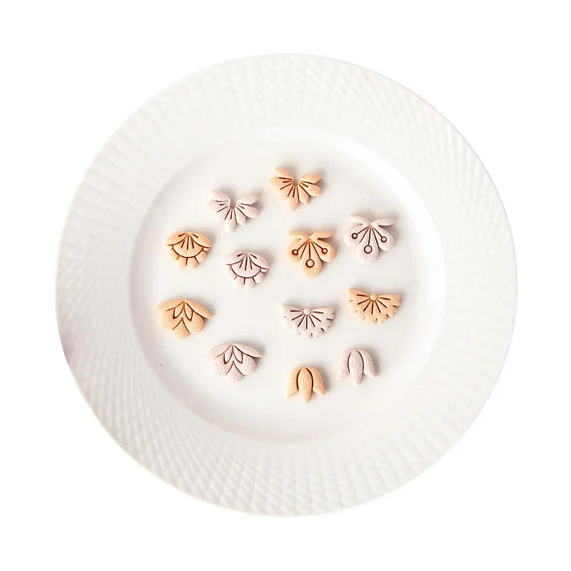 Description Picture 6 of itemCartoon Mini Flower Soft Pottery Ceramic Clay Molds Flower Petal Shaped Clay Cutters for Jewelry Earrings Pendant Handmade Tools