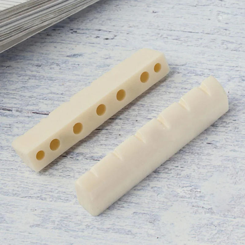 Description Picture 6 of item10 PCS Guitar Bone String Nut 43mmx6mmx8.4mm Luthier Saddle Bridge ST DIY Musical Instruments Guitars Accessories Parts