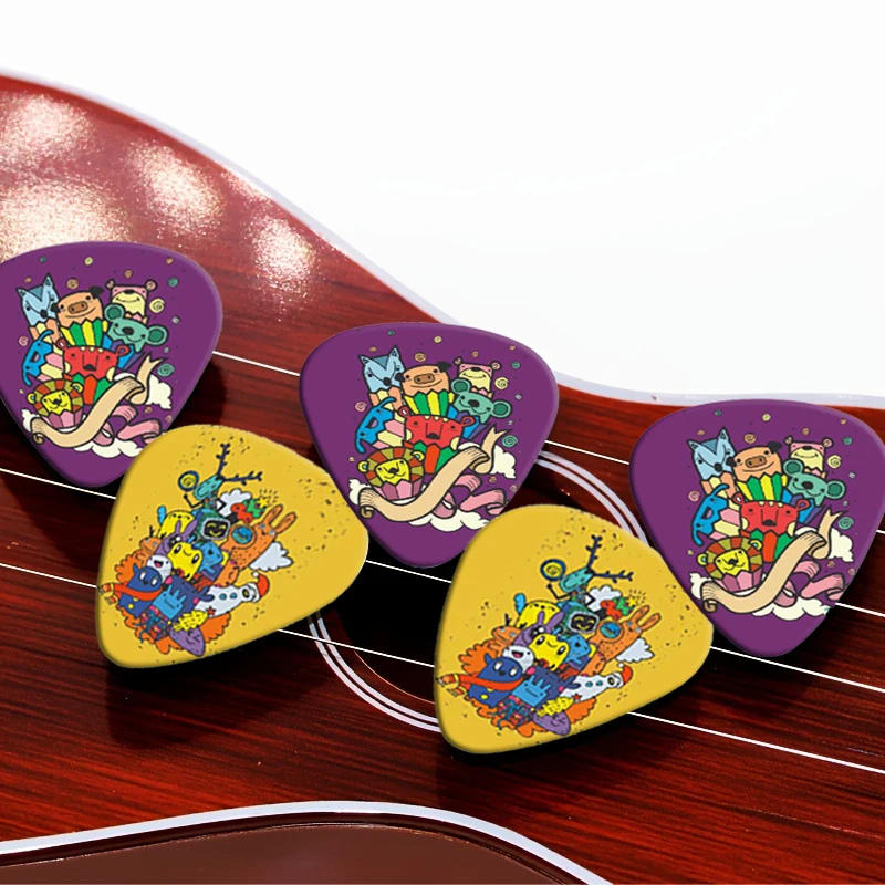 Description Picture 2 of itemSOACH 10Pcs/lot 0.71 0.46 1.0mm Thickness Cartoon Graffiti animal Guitar Picks Pattern Guitar Paddles Guitar Accessories pick