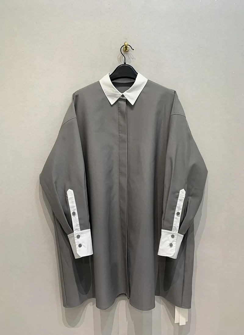 Description Picture 6 of itemKBQ Hit Color Spliced Button Minimalist Loose Coats For Women Lapel Long Sleeve Vintage Casual Coat Female Fashion Winter New