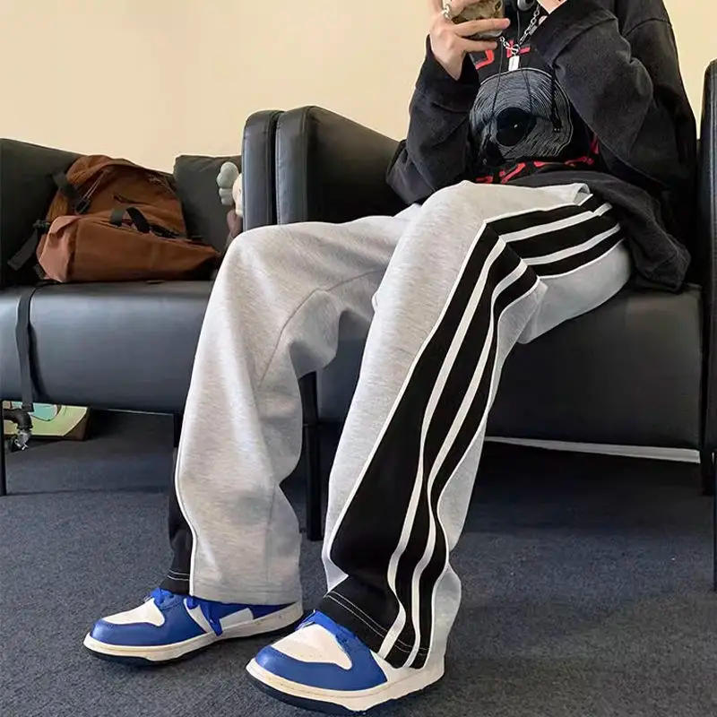 Description Picture 2 of itemAmerican style joint men and women spring/summer striped patchwork casual pants trend loose straight leg wide leg sports pants