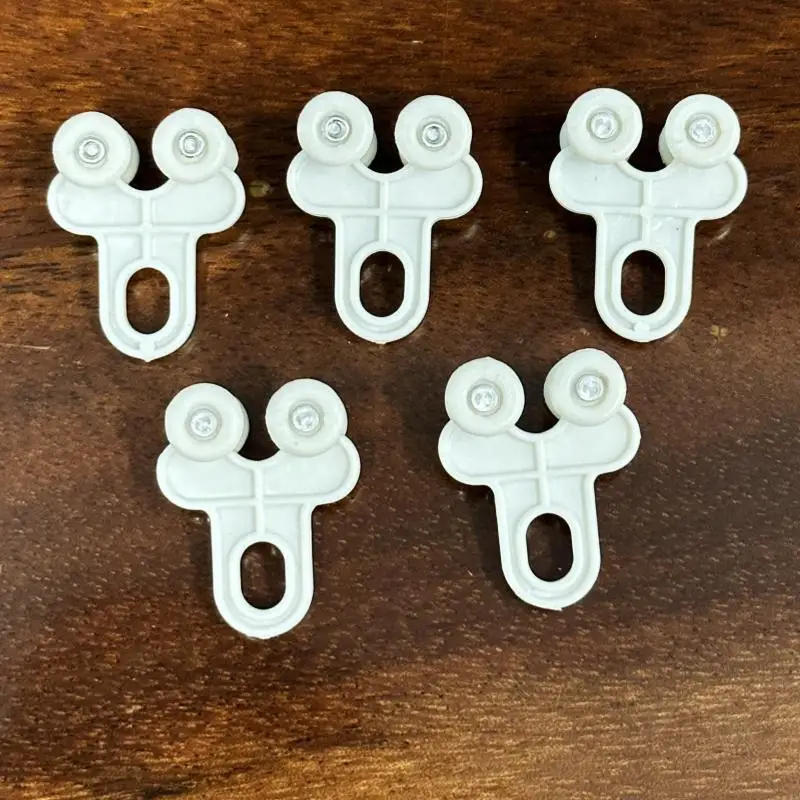 Description Picture 2 of item80PCS plastic nano silent curtain track pulley old-fashioned four wheel bead hanging wheel hook window decoration accessories
