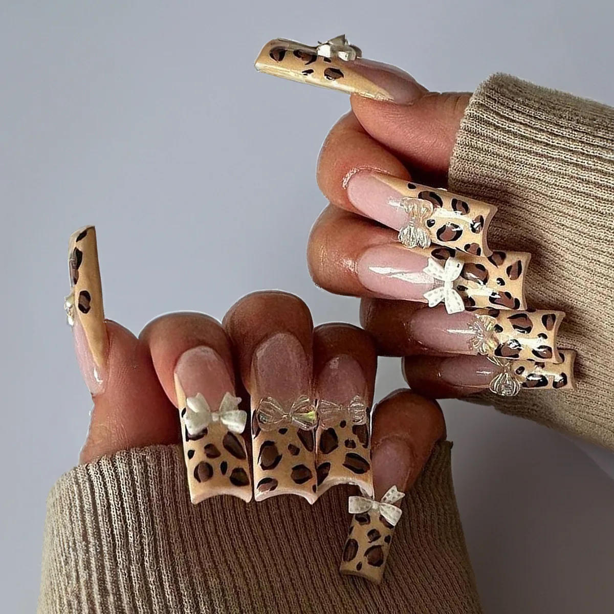 Description Picture 2 of item24Pcs Leopard Print Design False Nails with Bow Rhinestone Long Square Press on Nails Wearable French Ballet Fake Nail Tips