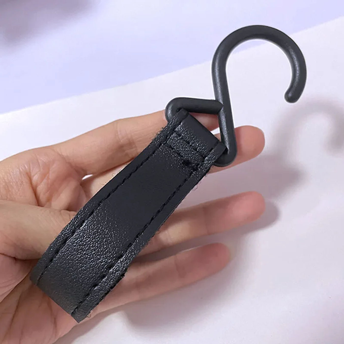 Description Picture 3 of item1/2pcs PU Leather Baby Stroller Hook Accessories Plastic Baby Car Carriage Hook Magical Stick Hook Pram Pushchair Hanger Hanging