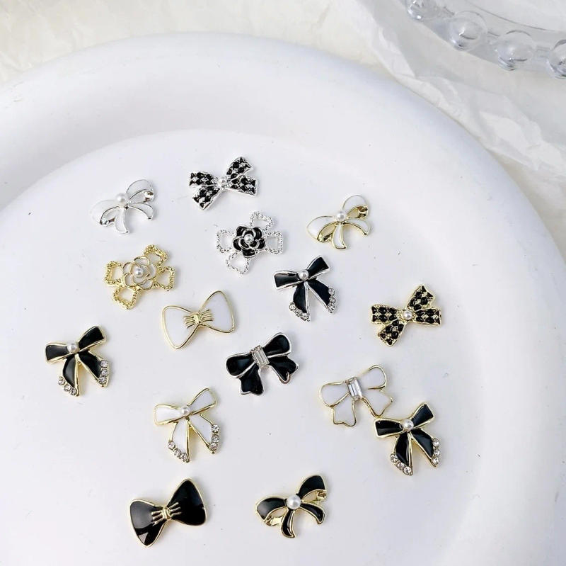 Description Picture 6 of item10PCS Luxury Japan Glossy Black White Pearl Floral Bow Tie Bowknot Alloy Nail Art Rhinestones Jewel Decorations Manicure Charms