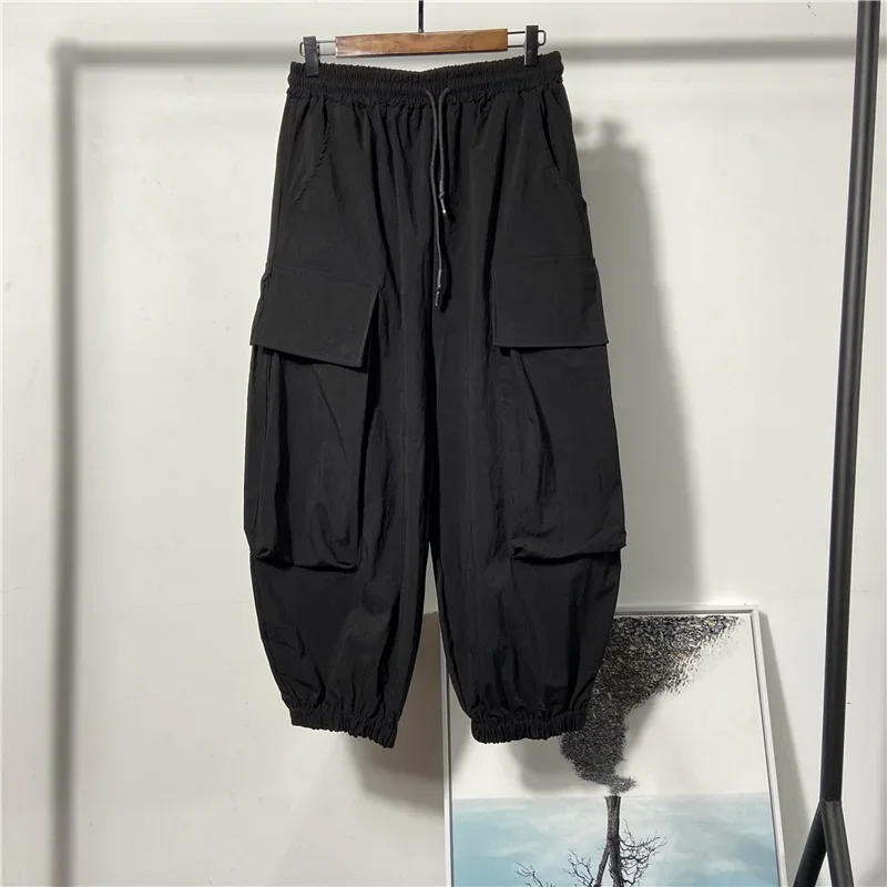 Description Picture 3 of itemHop Hip Mens Harem Pants Drawstring Elastic Waist Loose Bloomers Gothic Big Pocket Cargo Pants New Summer Casual Sweatpants Men