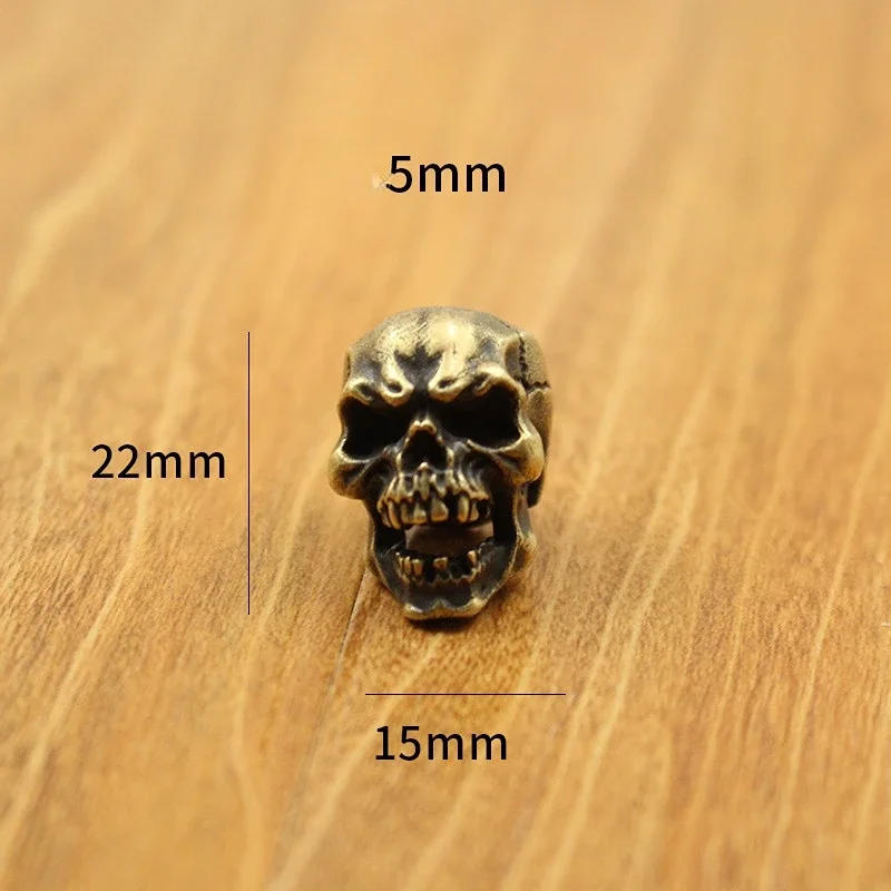 Description Picture 5 of itemCuspid Teeth Skull Head Brass Paracord Beads Lanyard Pendants DIY EDC Outdoor Tool Umbrella Rope Woven Knife Charms Accessories
