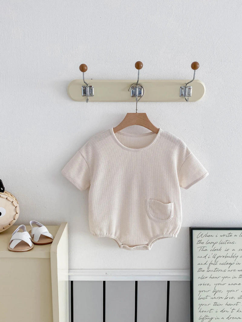 Description Picture 4 of itemNew Korean Style Baby Summer Cotton Simple Comfortable Short - Sleeve Waffle - Knit Onesie with Small Pocket Decoration Romper