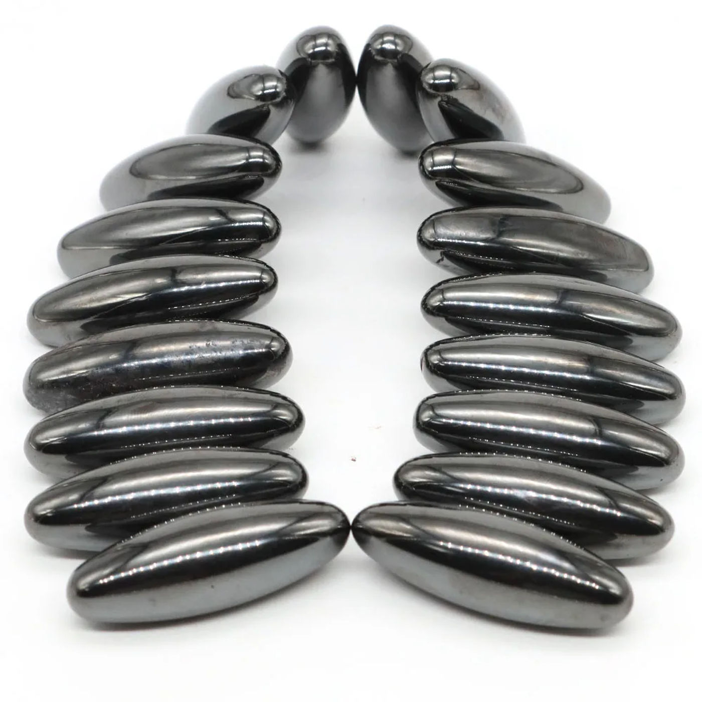 Description Picture 2 of item14x40mm Magnetic Rugby Ball Natual Hamtite Tumbled Stone Oval Magnet Beads Set Children's Toy Health Care Ferrite Massager Decor