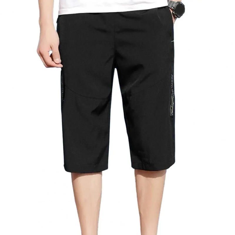 Description Picture 3 of itemSolid Color Cropped Pants Men's Elastic Waist Cropped Pants with Zipper Pockets Soft Breathable Mid-calf Trousers in for Men