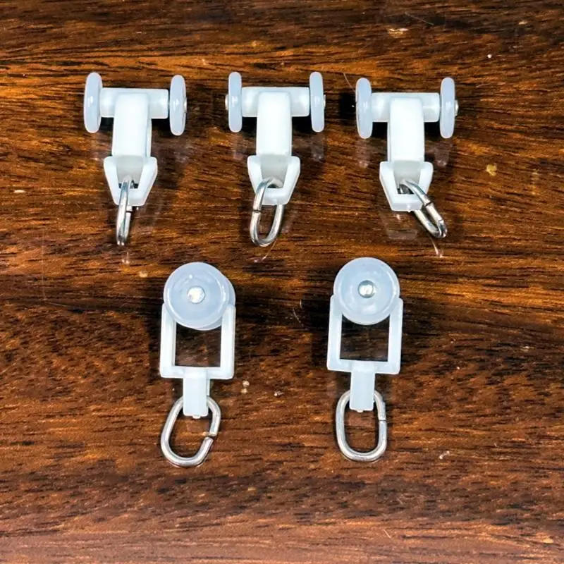 Description Picture 4 of item40PCS plastic track pulley old-fashioned universal curtain bead hanging wheel hook window decoration hardware accessories