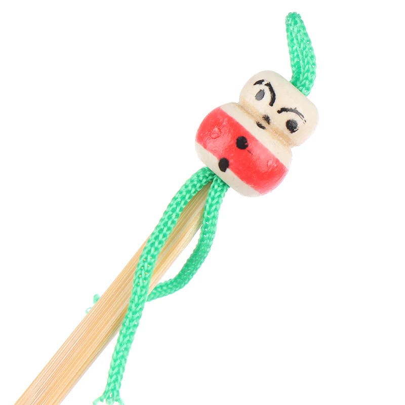 Description Picture 4 of item10Pcs Mini Doll Earpicks Wood Bamboo Ear Picks Wax Remover Cleaner Ear Care Tool