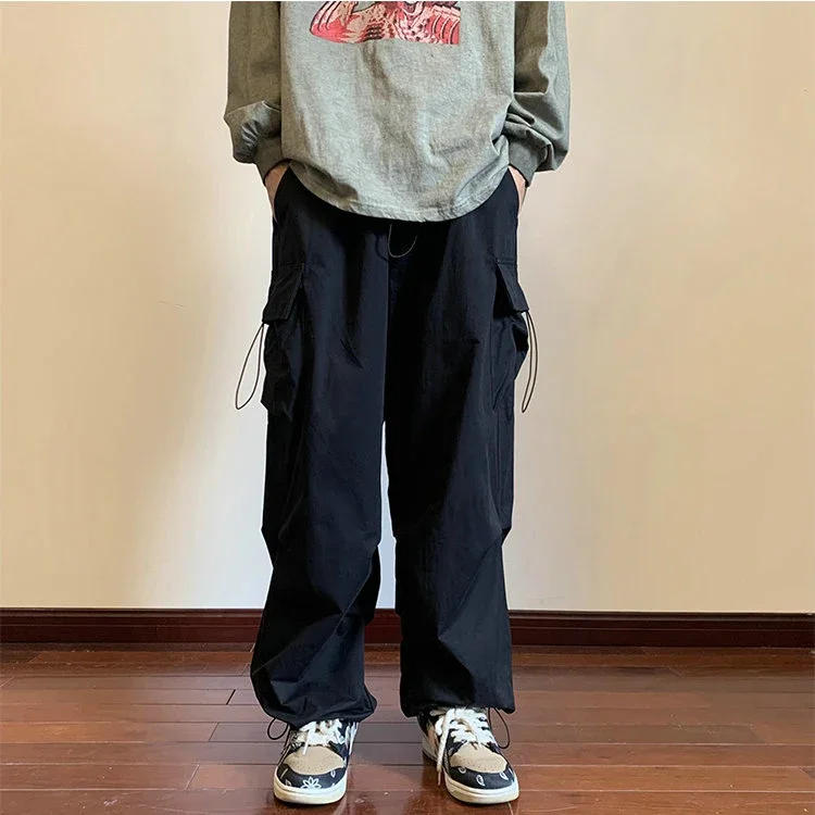 Description Picture 5 of itemStreetwear Spring Harem Casual Pants Men Elastic Waist Solid Color Cargo Pants Multi Pocket Loose Baggy Pants For Women