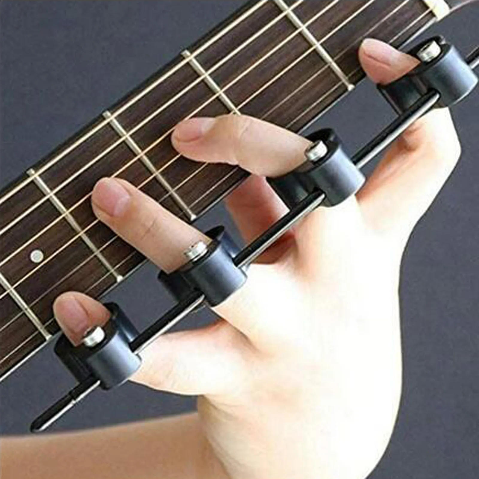 Description Picture 2 of itemAdjustable Finger Expander Guitar Training Span Trainer Finger Lute Size Featu solid fashion High Quality Musical Instrument