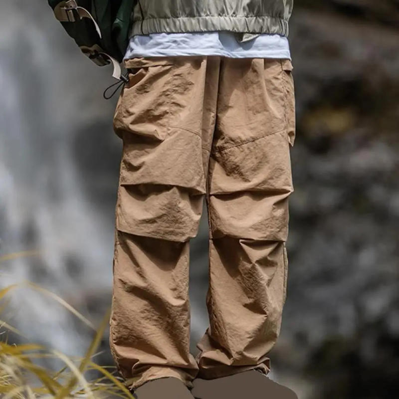 Description Picture 3 of itemMen Outdoor Pants Elastic Waist Loose Solid Color Multi Pockets Loose Smooth Straight Pants Camping Climbing Long Cargo Trousers