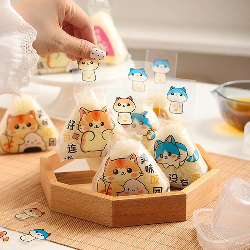 Description Picture 2 of item100Pcs Lovely Cartoon Triangle Rice Ball Packing Bag Seaweed Onigiri Sushi Making Mold Tools Bento Accessories