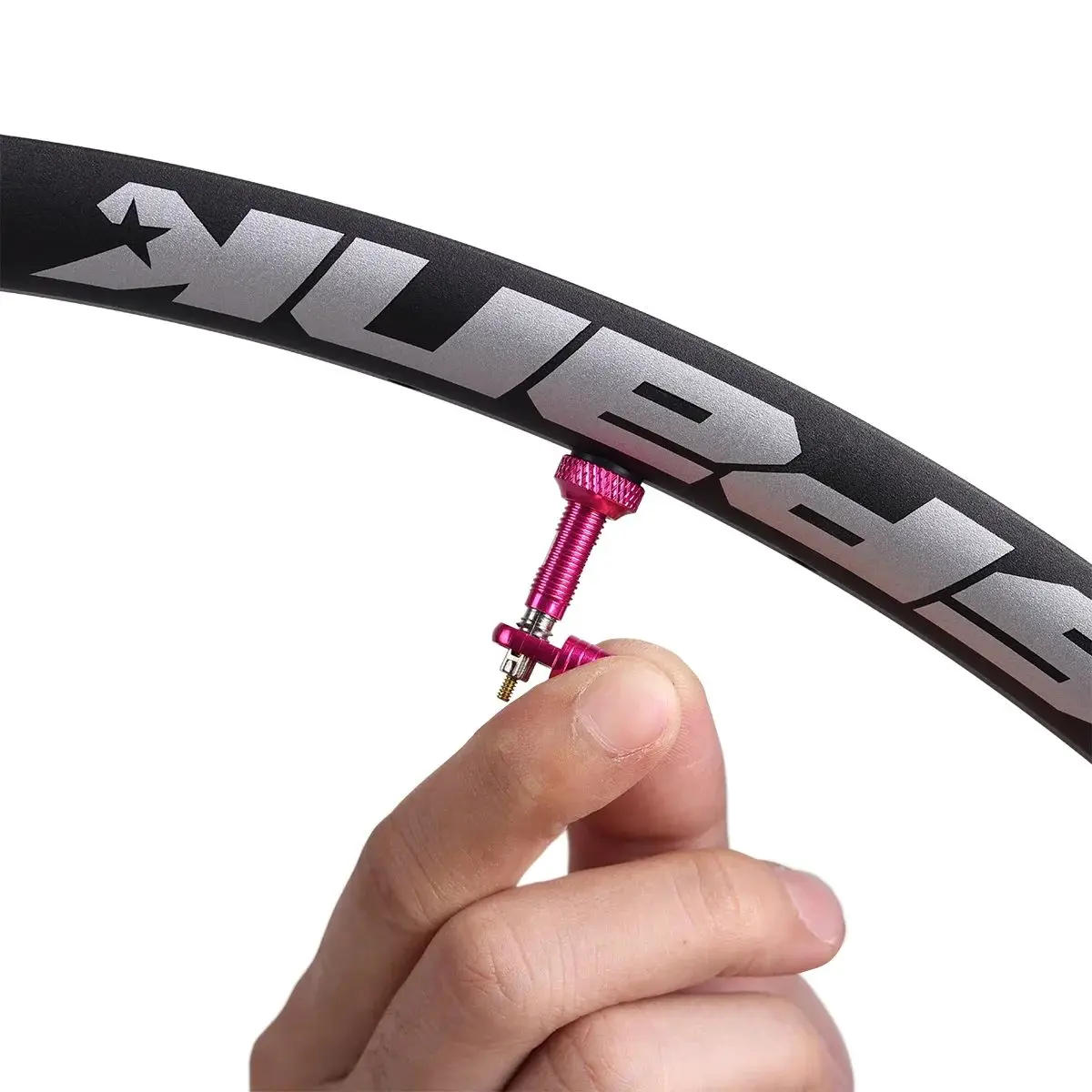 Description Picture 5 of itemSPANK FRATELLI TUBELESS VALVE KIT 40MM The valve cap doubles as the core removal tool