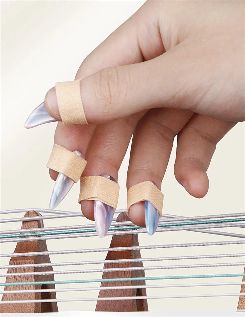 Description Picture 6 of item8PCS Guzheng Finger Picks Practical Musical Instrument Celluloid Guzheng Nail Covers Stringed Instrument Accessories Two Sizes