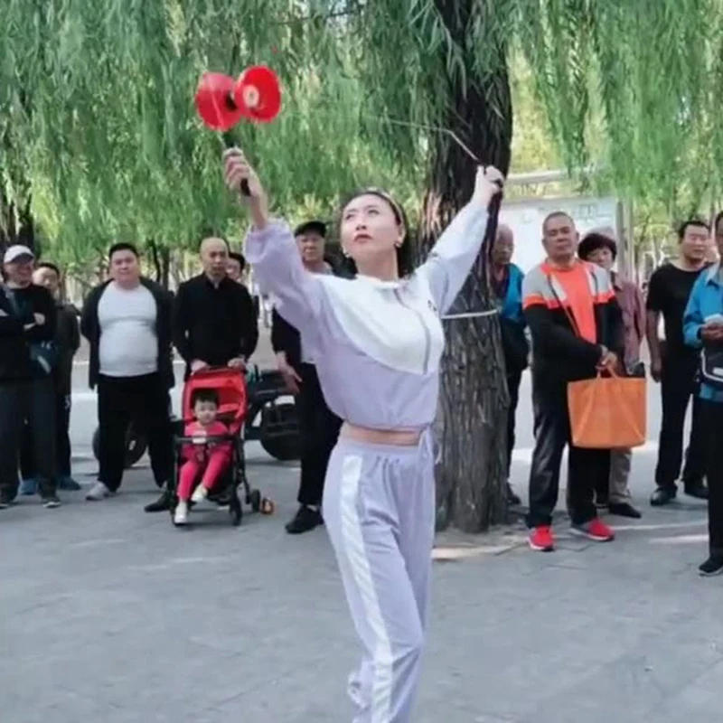 Description Picture 5 of itemDouble-Headed Shaking Rod Diabolo Children's Students And The Elderly Outdoor Fitness Sensory Training Equipment